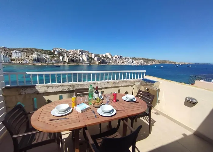 Blue Harbour Seafront Penthouse With Large Terrace With Panoramic Sea Views - By Getawaysmalta